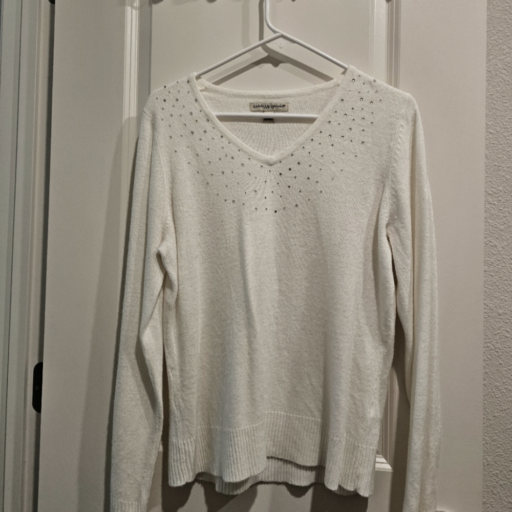 Sweater with rhinestones.